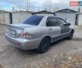 Сірий Міцубісі Lancer, об'ємом двигуна 1.58 л та пробігом 305 тис. км за 3300 $, фото 4 на Automoto.ua