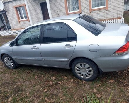 Серый Мицубиси Лансер, объемом двигателя 1.6 л и пробегом 220 тыс. км за 4000 $, фото 2 на Automoto.ua