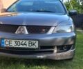 Сірий Міцубісі Lancer, об'ємом двигуна 2 л та пробігом 160 тис. км за 4900 $, фото 4 на Automoto.ua