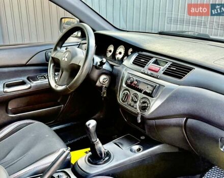 Сірий Міцубісі Lancer, об'ємом двигуна 1.6 л та пробігом 395 тис. км за 4900 $, фото 18 на Automoto.ua