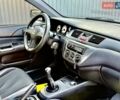 Сірий Міцубісі Lancer, об'ємом двигуна 1.6 л та пробігом 395 тис. км за 4900 $, фото 18 на Automoto.ua