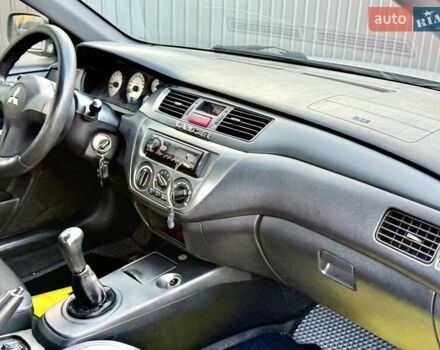 Сірий Міцубісі Lancer, об'ємом двигуна 1.6 л та пробігом 395 тис. км за 4900 $, фото 19 на Automoto.ua