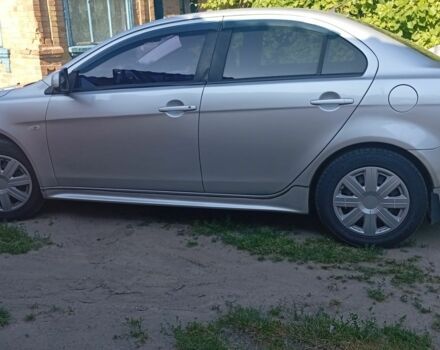 Серый Мицубиси Лансер, объемом двигателя 1.5 л и пробегом 215 тыс. км за 4999 $, фото 1 на Automoto.ua