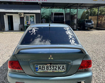 Сірий Міцубісі Lancer, об'ємом двигуна 1.58 л та пробігом 180 тис. км за 4400 $, фото 7 на Automoto.ua