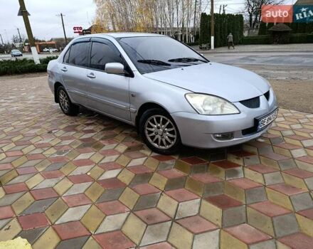 Серый Мицубиси Лансер, объемом двигателя 1.6 л и пробегом 268 тыс. км за 2900 $, фото 1 на Automoto.ua