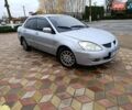 Серый Мицубиси Лансер, объемом двигателя 1.6 л и пробегом 268 тыс. км за 2900 $, фото 1 на Automoto.ua