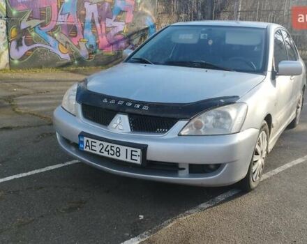 Серый Мицубиси Лансер, объемом двигателя 1.6 л и пробегом 205 тыс. км за 4500 $, фото 4 на Automoto.ua
