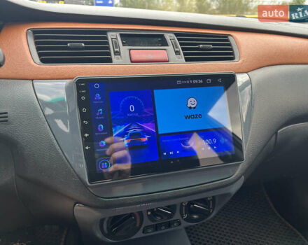 Серый Мицубиси Лансер, объемом двигателя 1.58 л и пробегом 232 тыс. км за 4900 $, фото 20 на Automoto.ua