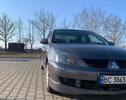 Серый Мицубиси Лансер, объемом двигателя 1.6 л и пробегом 260 тыс. км за 3950 $, фото 1 на Automoto.ua