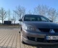 Серый Мицубиси Лансер, объемом двигателя 1.6 л и пробегом 260 тыс. км за 3950 $, фото 1 на Automoto.ua