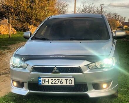 Серый Мицубиси Лансер, объемом двигателя 2 л и пробегом 226 тыс. км за 6200 $, фото 2 на Automoto.ua