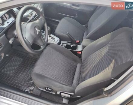 Сірий Міцубісі Lancer, об'ємом двигуна 1.58 л та пробігом 122 тис. км за 6300 $, фото 31 на Automoto.ua
