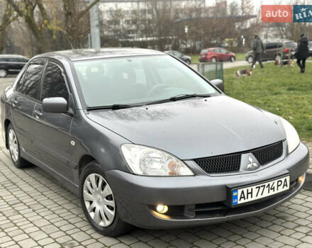 Сірий Міцубісі Lancer, об'ємом двигуна 1.6 л та пробігом 177 тис. км за 2800 $, фото 11 на Automoto.ua