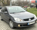 Сірий Міцубісі Lancer, об'ємом двигуна 1.6 л та пробігом 177 тис. км за 2800 $, фото 11 на Automoto.ua