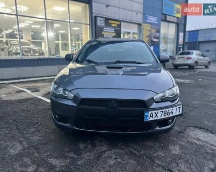 Серый Мицубиси Лансер, объемом двигателя 2 л и пробегом 170 тыс. км за 6999 $, фото 2 на Automoto.ua