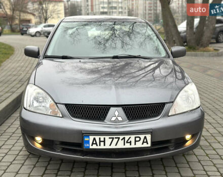 Сірий Міцубісі Lancer, об'ємом двигуна 1.6 л та пробігом 177 тис. км за 2800 $, фото 16 на Automoto.ua