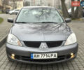 Сірий Міцубісі Lancer, об'ємом двигуна 1.6 л та пробігом 177 тис. км за 2800 $, фото 16 на Automoto.ua
