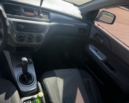 Серый Мицубиси Лансер, объемом двигателя 1.6 л и пробегом 265 тыс. км за 4100 $, фото 11 на Automoto.ua