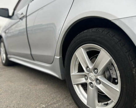 Серый Мицубиси Лансер, объемом двигателя 2 л и пробегом 286 тыс. км за 5800 $, фото 7 на Automoto.ua