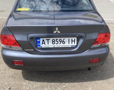 Сірий Міцубісі Lancer, об'ємом двигуна 1.59 л та пробігом 44 тис. км за 6200 $, фото 5 на Automoto.ua