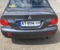 Сірий Міцубісі Lancer, об'ємом двигуна 1.59 л та пробігом 44 тис. км за 6200 $, фото 5 на Automoto.ua
