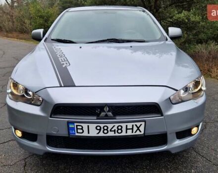 Серый Мицубиси Лансер, объемом двигателя 2 л и пробегом 213 тыс. км за 6550 $, фото 5 на Automoto.ua