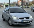 Сірий Міцубісі Lancer, об'ємом двигуна 1.6 л та пробігом 200 тис. км за 3900 $, фото 4 на Automoto.ua