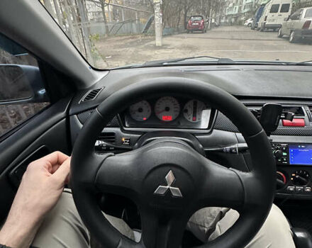 Серый Мицубиси Лансер, объемом двигателя 1.6 л и пробегом 238 тыс. км за 4400 $, фото 20 на Automoto.ua