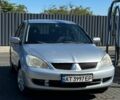 Сірий Міцубісі Lancer, об'ємом двигуна 1.6 л та пробігом 460 тис. км за 3200 $, фото 1 на Automoto.ua