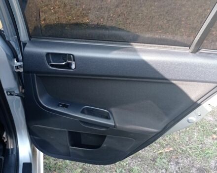 Серый Мицубиси Лансер, объемом двигателя 2 л и пробегом 180 тыс. км за 5800 $, фото 17 на Automoto.ua