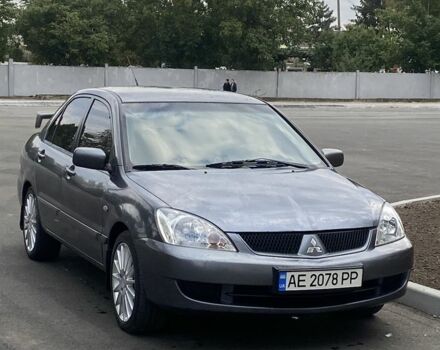 Серый Мицубиси Лансер, объемом двигателя 1.6 л и пробегом 250 тыс. км за 3999 $, фото 18 на Automoto.ua
