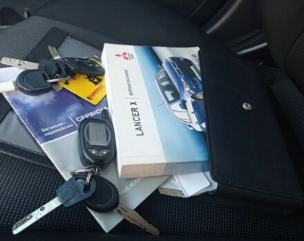 Серый Мицубиси Лансер, объемом двигателя 2 л и пробегом 180 тыс. км за 5800 $, фото 8 на Automoto.ua