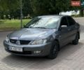 Серый Мицубиси Лансер, объемом двигателя 1.59 л и пробегом 150 тыс. км за 3700 $, фото 1 на Automoto.ua
