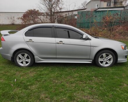 Серый Мицубиси Лансер, объемом двигателя 2 л и пробегом 124 тыс. км за 7499 $, фото 5 на Automoto.ua