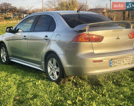 Серый Мицубиси Лансер, объемом двигателя 2 л и пробегом 226 тыс. км за 6200 $, фото 5 на Automoto.ua