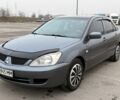 Сірий Міцубісі Lancer, об'ємом двигуна 1.6 л та пробігом 270 тис. км за 4300 $, фото 1 на Automoto.ua