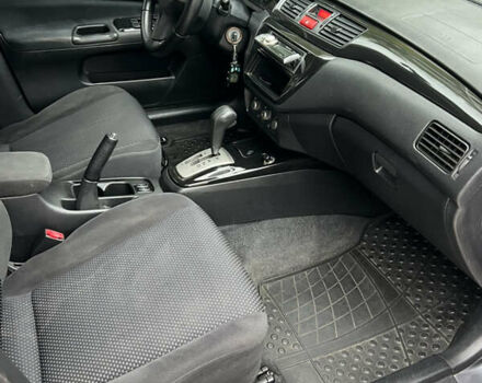 Сірий Міцубісі Lancer, об'ємом двигуна 1.58 л та пробігом 176 тис. км за 4700 $, фото 12 на Automoto.ua