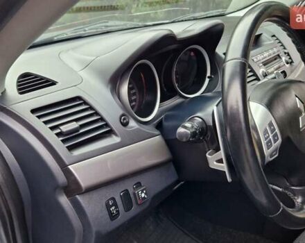 Серый Мицубиси Лансер, объемом двигателя 2 л и пробегом 213 тыс. км за 6550 $, фото 12 на Automoto.ua