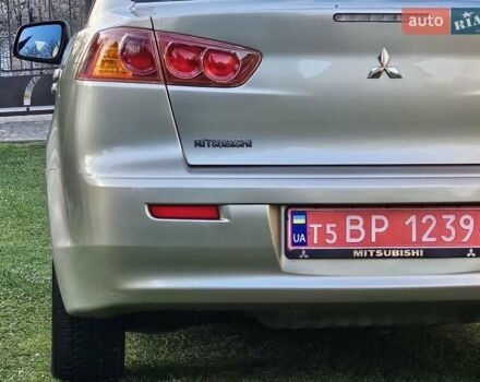 Серый Мицубиси Лансер, объемом двигателя 2 л и пробегом 282 тыс. км за 5450 $, фото 32 на Automoto.ua