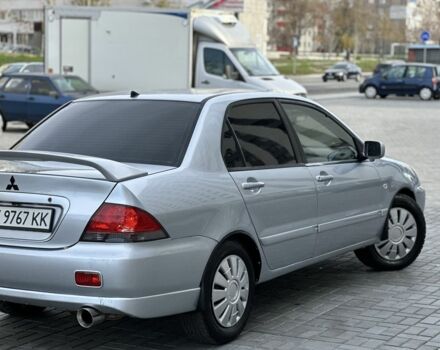 Сірий Міцубісі Lancer, об'ємом двигуна 1.6 л та пробігом 200 тис. км за 3900 $, фото 1 на Automoto.ua