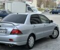 Сірий Міцубісі Lancer, об'ємом двигуна 1.6 л та пробігом 200 тис. км за 3900 $, фото 1 на Automoto.ua