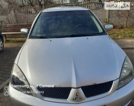 Сірий Міцубісі Lancer, об'ємом двигуна 1.58 л та пробігом 190 тис. км за 4700 $, фото 5 на Automoto.ua