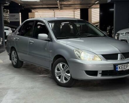 Серый Мицубиси Лансер, объемом двигателя 1.58 л и пробегом 271 тыс. км за 4200 $, фото 1 на Automoto.ua