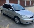 Сірий Міцубісі Lancer, об'ємом двигуна 1.6 л та пробігом 270 тис. км за 3800 $, фото 3 на Automoto.ua