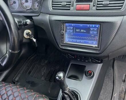 Сірий Міцубісі Lancer, об'ємом двигуна 1.58 л та пробігом 341 тис. км за 4500 $, фото 5 на Automoto.ua