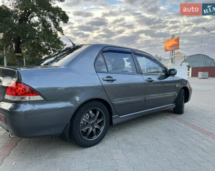 Сірий Міцубісі Lancer, об'ємом двигуна 1.6 л та пробігом 189 тис. км за 6200 $, фото 5 на Automoto.ua