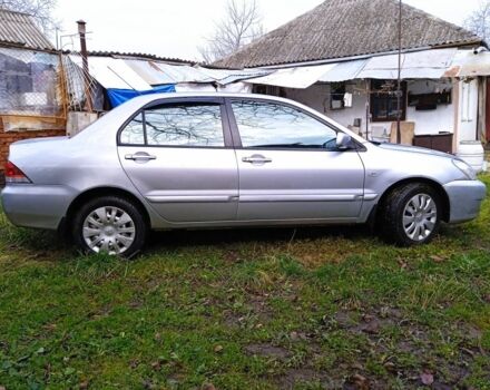 Сірий Міцубісі Lancer, об'ємом двигуна 1 л та пробігом 400 тис. км за 2850 $, фото 3 на Automoto.ua