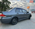 Сірий Міцубісі Lancer, об'ємом двигуна 1.6 л та пробігом 189 тис. км за 6200 $, фото 5 на Automoto.ua