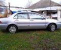 Сірий Міцубісі Lancer, об'ємом двигуна 1 л та пробігом 400 тис. км за 2850 $, фото 3 на Automoto.ua