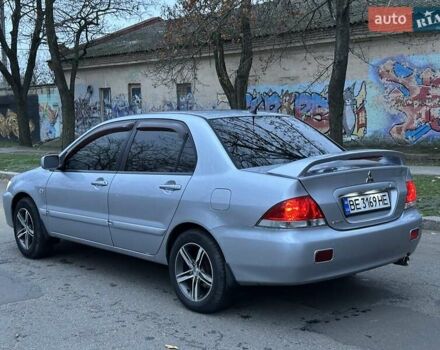 Серый Мицубиси Лансер, объемом двигателя 1.6 л и пробегом 210 тыс. км за 4600 $, фото 4 на Automoto.ua